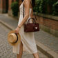 Mahogany Charm – Double-Zip Leather Tote with Smiling Petal Detail